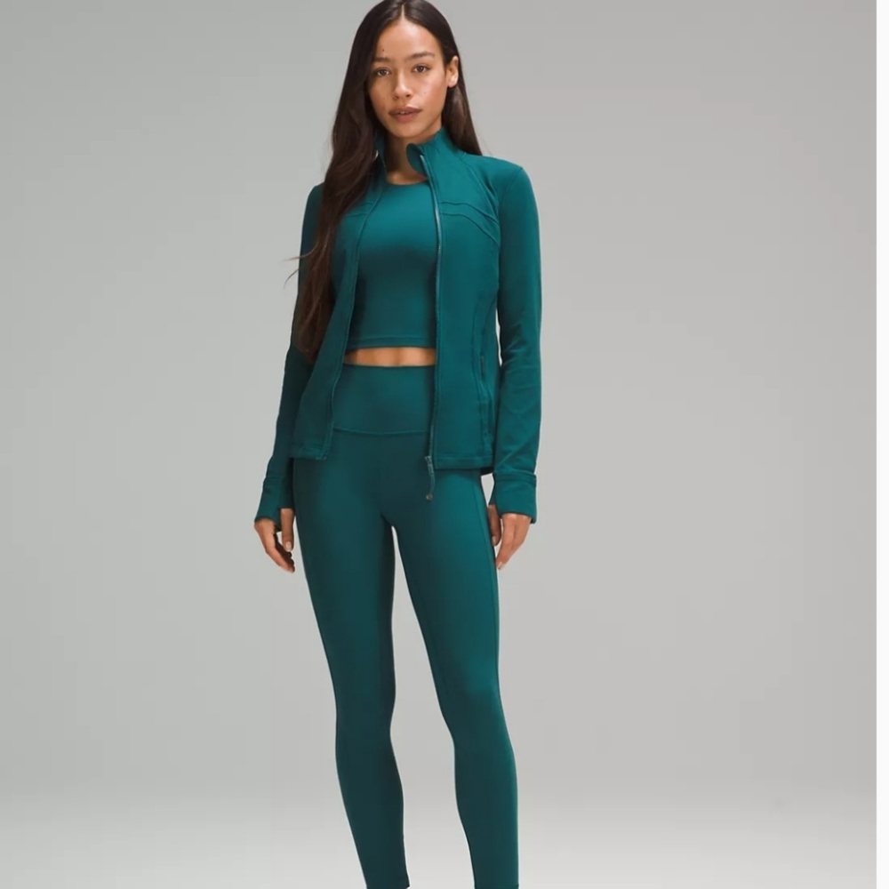 New W/tags. Two for one. Teal athletica set